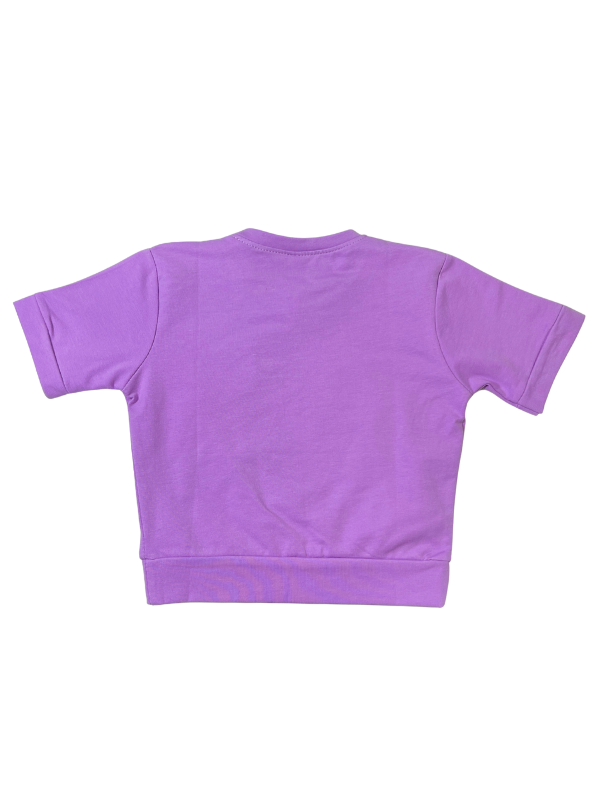 Girls' short-sleeve lavender/purple top with a large central graphic featuring a pink heart, the word 'LOVE' in white sequins, and small yellow hearts.

Export to Sheets