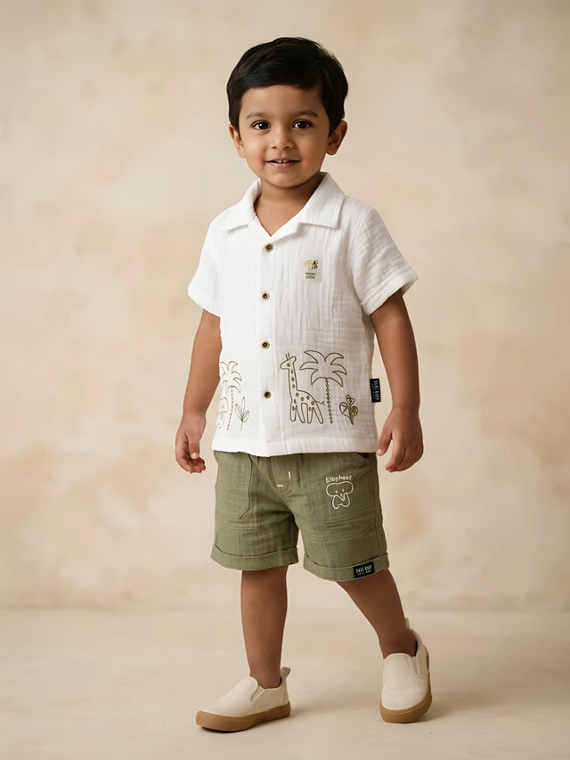 White printed short sleeve shirt and olive green shorts boys coordinate set.