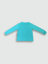 Light blue boys' short-sleeve T-shirt with a horizontal ribbed texture, featuring a small circular graphic of a cross emblem with surrounding text on the chest.