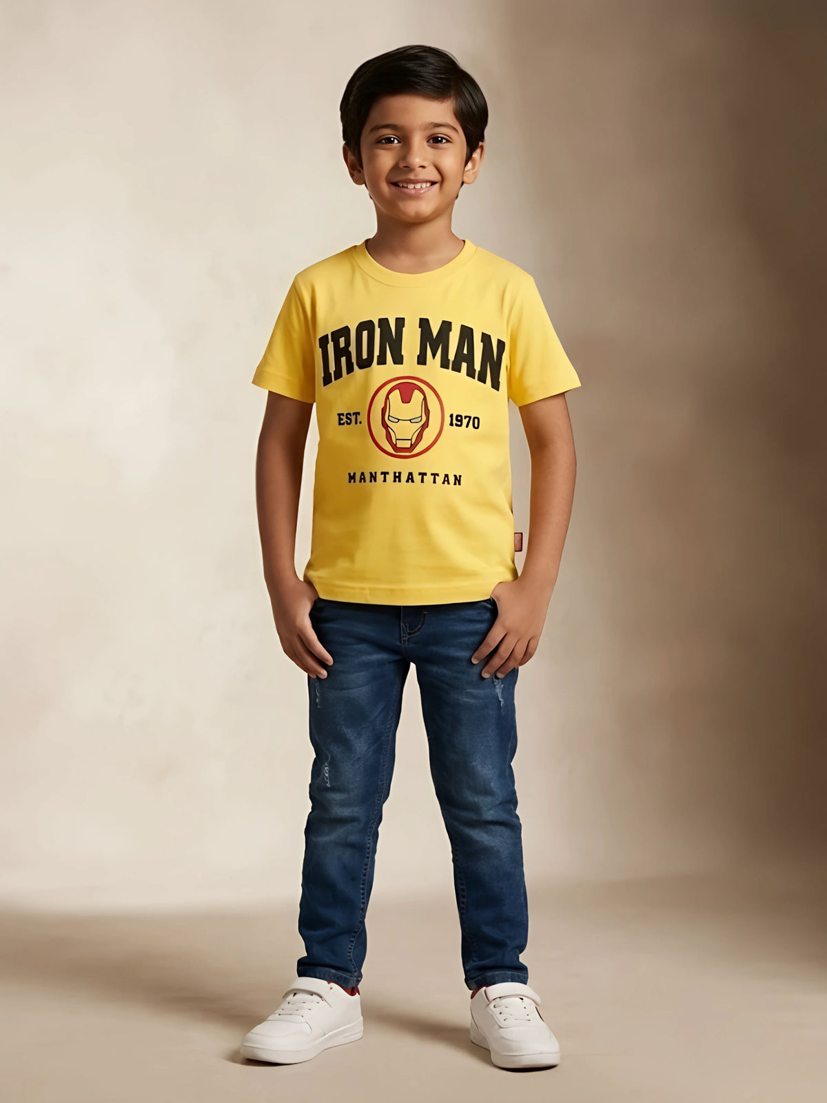 Boys wearing a bright yellow short-sleeve graphic t-shirt with an Iron Man chest print and classic crew neck.