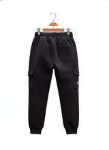 Black fleece jogger pants for boys featuring cargo style pockets, an embroidered 'EXPLORER' graphic, and a drawstring waist.