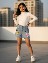 Girls' Light Blue Denim Shorts with Vibrant Graphic Patches and Relaxed Fit.