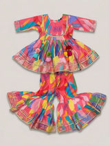 Girls Peach Printed Ethnic Sharara Set with Tassels.