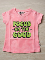 Girls Pink "Focus On The Good" Graphic T-Shirt.