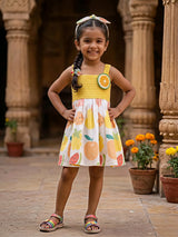 Girls Vibrant Yellow Smocked Cotton Frock with Fruit Print