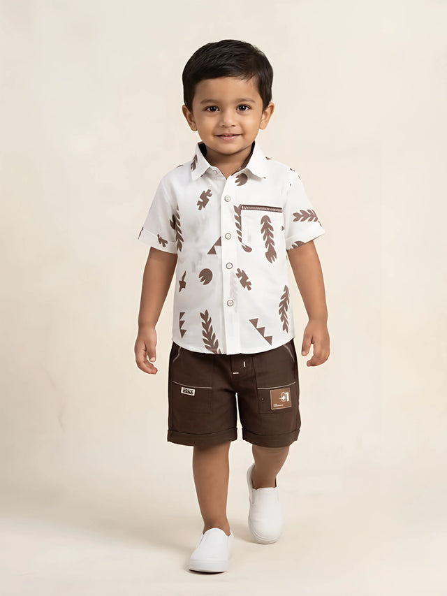 Brown and white leaf print boys coordinate set featuring a short sleeve shirt and shorts.
