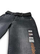 Boys' plain black denim jeans in a straight-leg style, featuring a gathered elastic waistband and a black web belt with a gold rectangular buckle.

Export to Sheets