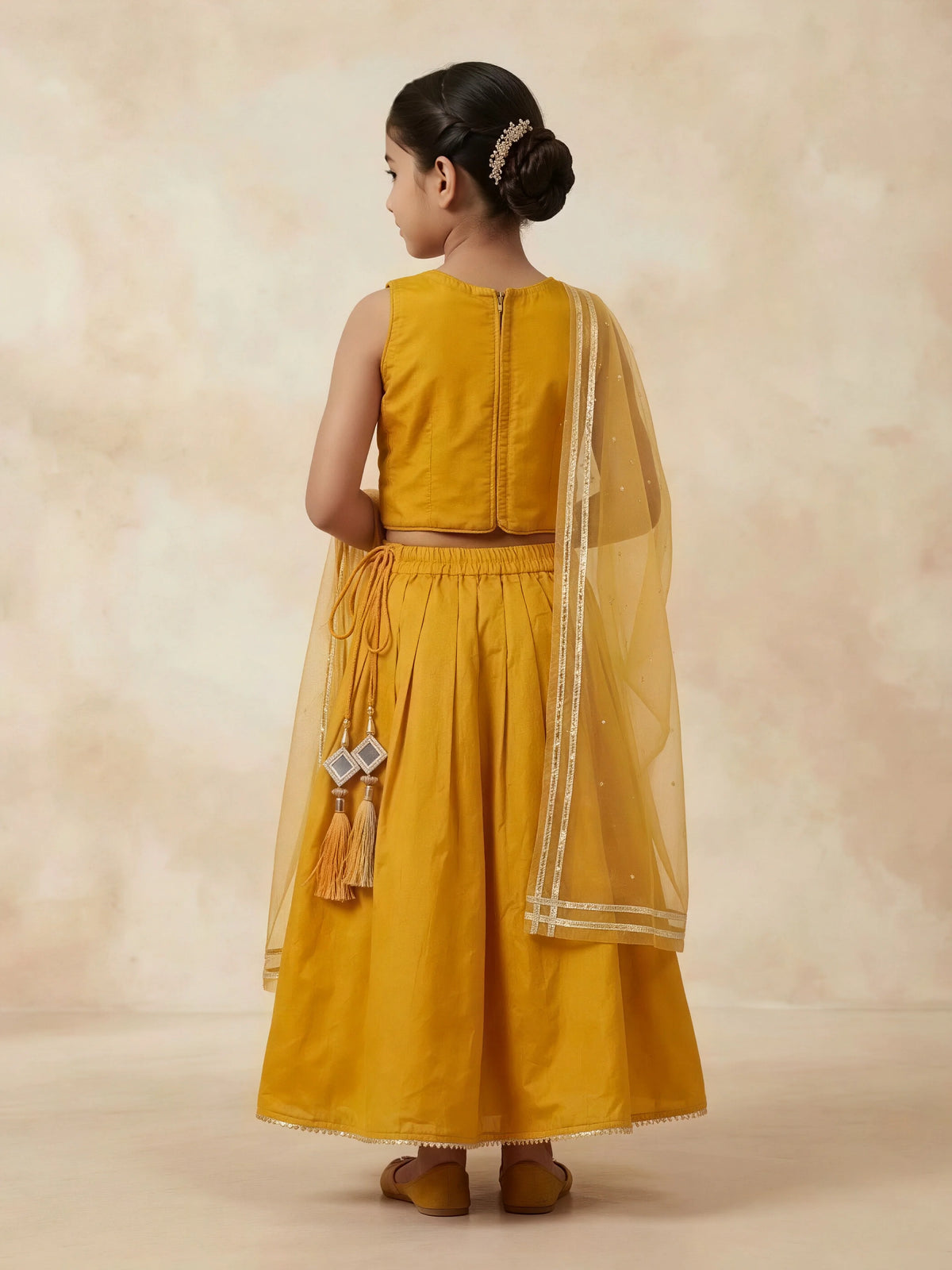 Girls Yellow Printed Lehenga Choli Set.