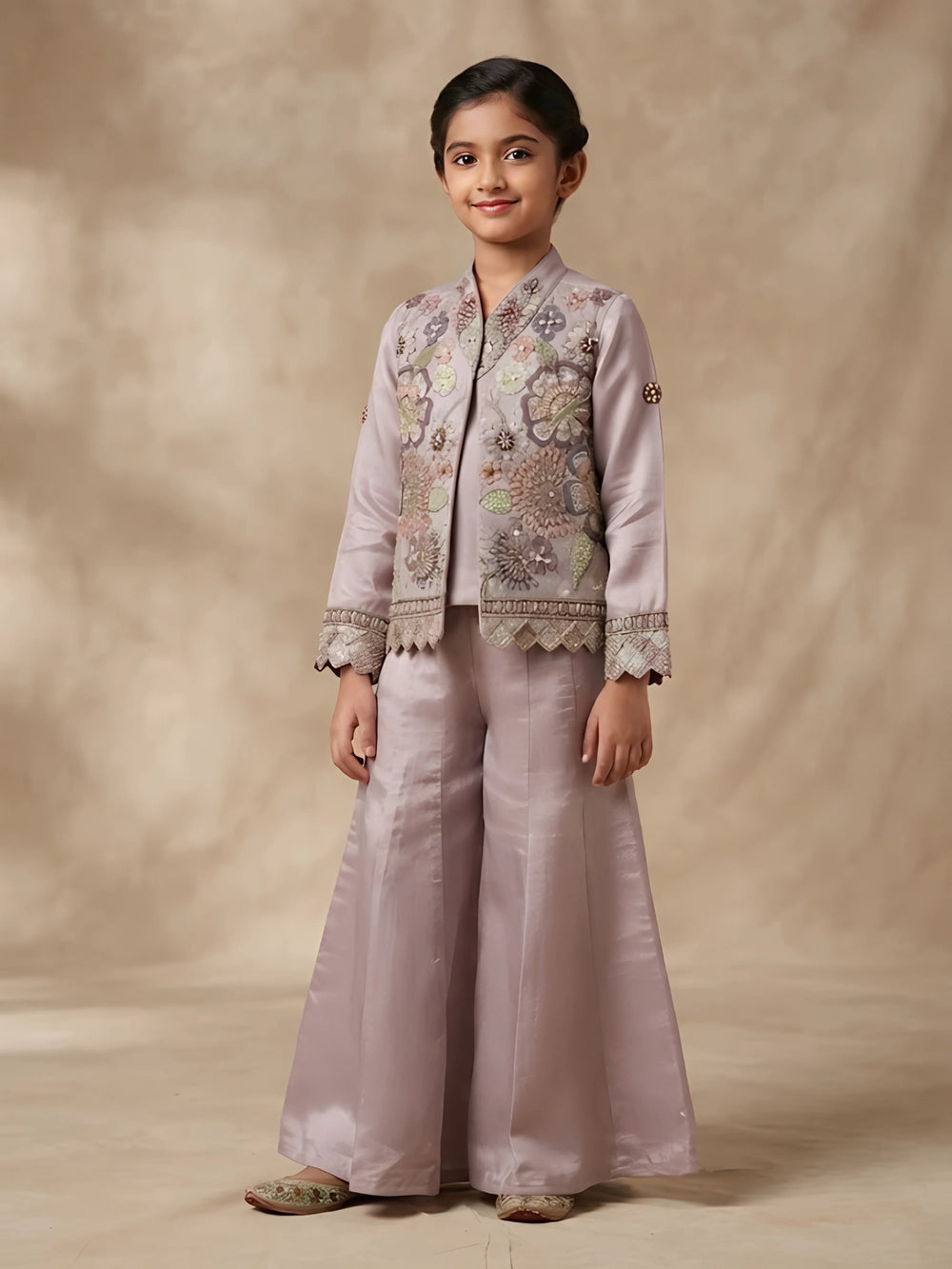 Girls purple embroidered kurta pajama set with matching jacket and pleated pants.