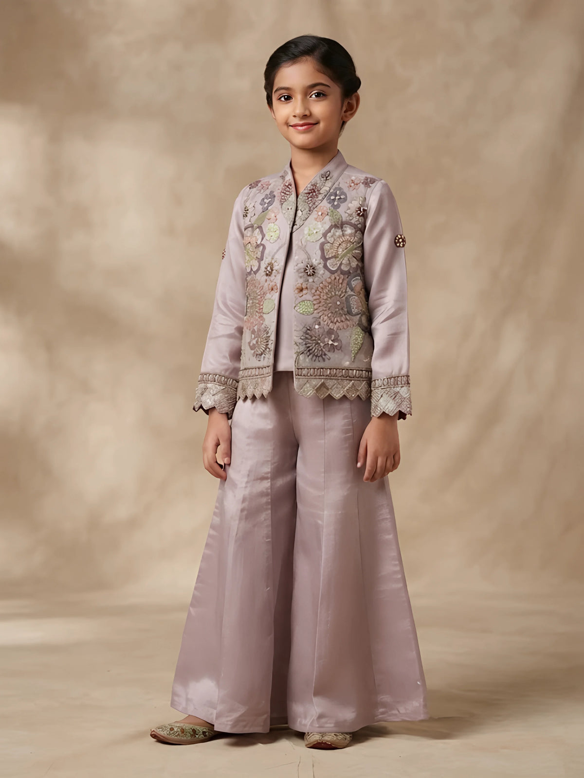 Girls purple embroidered kurta pajama set with matching jacket and pleated pants.