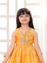 Girls Sleeveless Yellow Bandhani Print Peplum Top and Patiala Suit