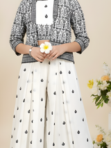 Girls' Elegant Cream & Gold Sharara Suit with Intricate Embroidery and Floral Shawl