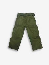 Boys' dark olive green cargo pants with many zippered side pockets, a matching web belt, and cuffed or slightly cropped leg openings.

Export to Sheets