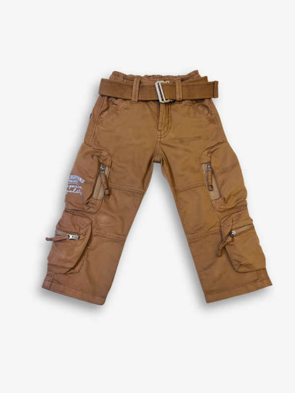 Boys' rustic brown cargo pants with many zippered side pockets, a matching web belt, and cuffed or slightly cropped leg openings.

Export to Sheets