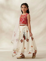Red sleeveless top and white layered skirt set for girls.
