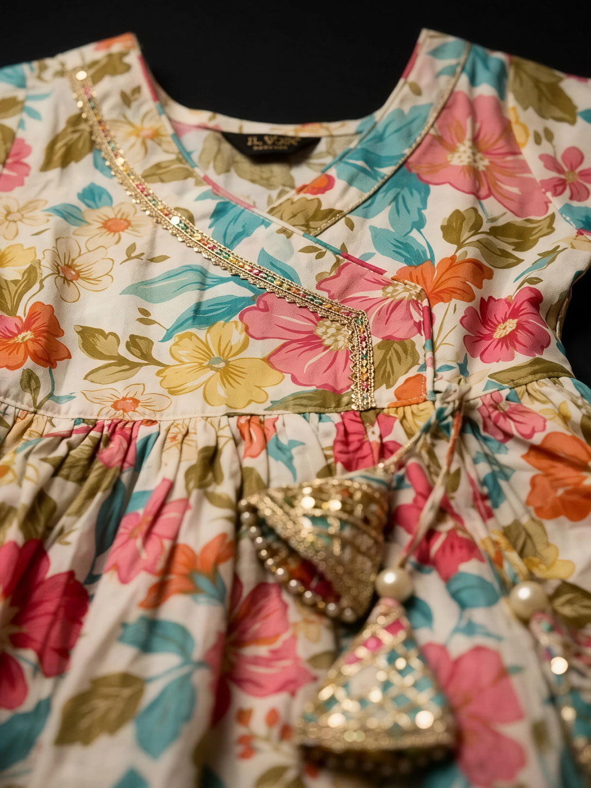 Girls Cream Floral Angrakha Sharara Set.