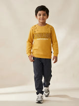 Yellow graphic t-shirt for boys with ribbed texture and text print.