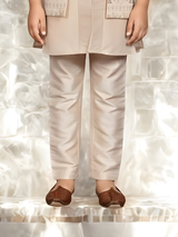 Boys' Elegant Cream Kurta Set with Contrasting Embroidered Vest.