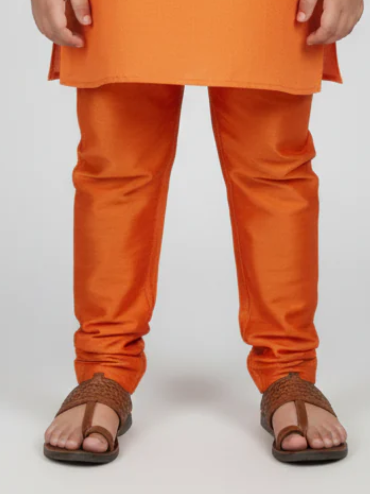Boys' Vibrant Orange Kurta Pajama Set with Teal Geometric Print Jacket.