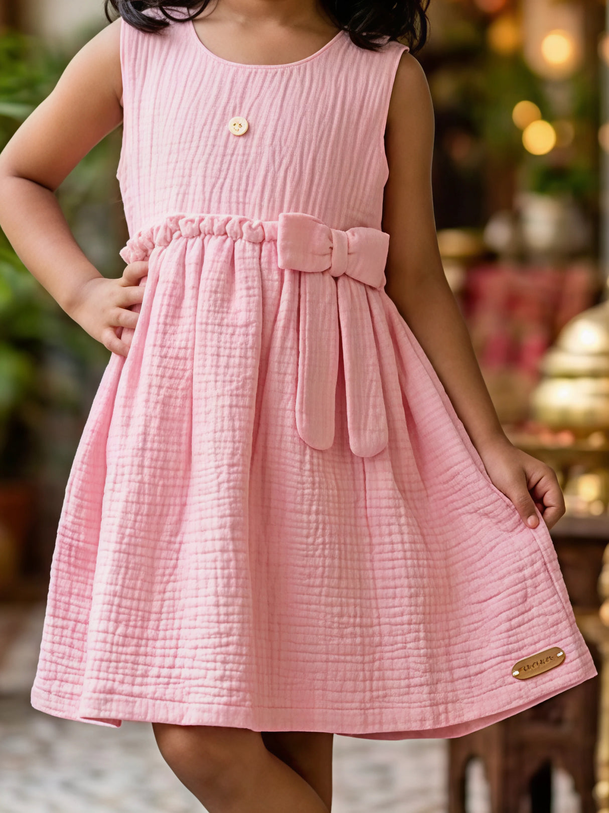 Girls' Pastel Pink Textured Cotton Frock with Bow Detail