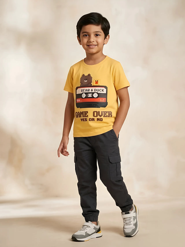 Yellow graphic print t-shirt for boys featuring a bear and duck cassette design.