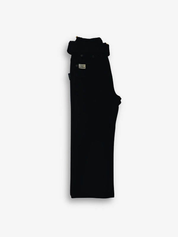 Boys' solid black casual or denim pants with an elastic waist, straight leg, and a thick black web belt with a prominent rectangular silver buckle.

Export to Sheets