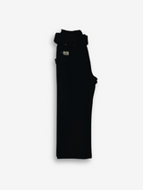 Boys' solid black casual or denim pants with an elastic waist, straight leg, and a thick black web belt with a prominent rectangular silver buckle.

Export to Sheets