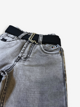 Boys' light grey wash denim jeans with a slightly faded look, an elasticated waist, and a thick black web belt with a silver rectangular buckle.