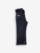 Boys' dark grey/black wash denim jeans with a slightly faded look, an elastic waist, and a thick black web belt with a rectangular silver buckle.

Export to Sheets
