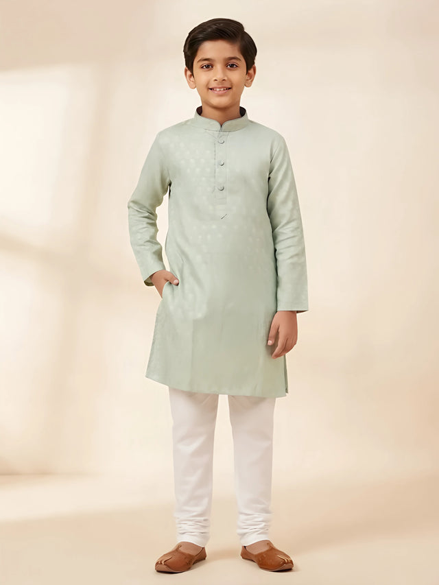 Boy's light green floral print kurta with white pajama set.