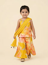Yellow floral print sharara set for girls with matching dupatta displayed on a white background