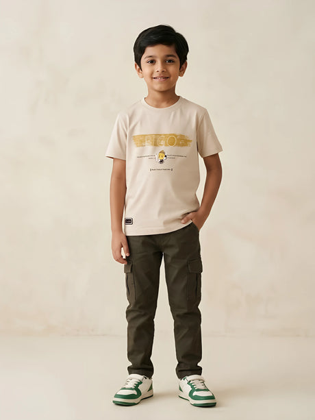 Cream printed t-shirt for boys displayed on a white background
