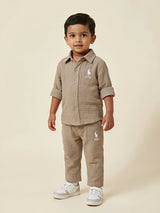 Grey textured cotton muslin boys coordinate set featuring a button-down shirt and matching pants.