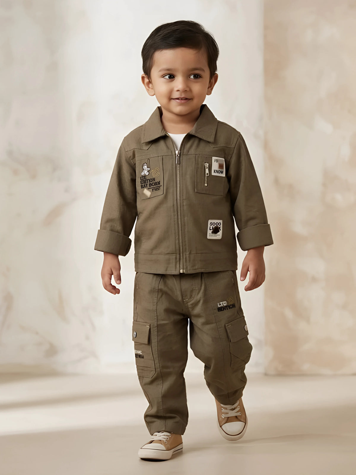 Olive green boys coordinate set featuring a zipped jacket and cargo pants with patch details.