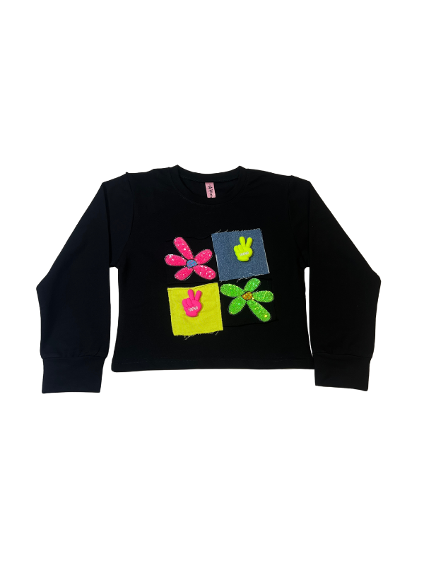 Girls' black long-sleeve top with four colorful patchwork squares and flower appliqués in neon pink, yellow, green, and blue on the chest.

Export to Sheets