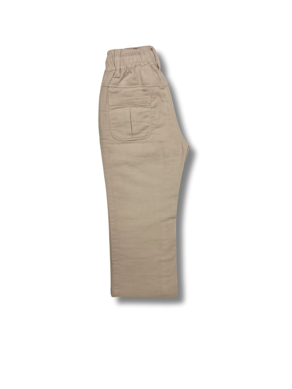 Boys' cream or pale khaki casual trousers with a comfortable elastic waistband, straight leg, and a thick, multicolored contrast rope drawstring.