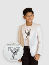Young boy wearing a crisp white blazer with a light gray feather graphic print, styled over a white t-shirt with a 'Peace Freedom' eagle graphic.