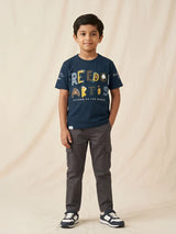 Navy blue graphic print t-shirt for boys with short sleeves and round neck.