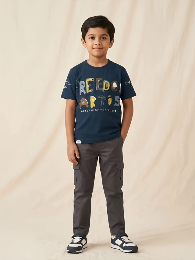 Navy blue graphic print t-shirt for boys with short sleeves and round neck.