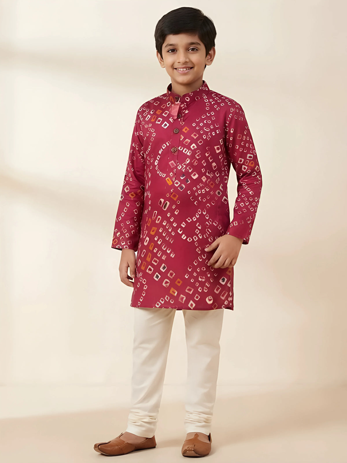 Boys red bandhani print kurta with cream pajama set