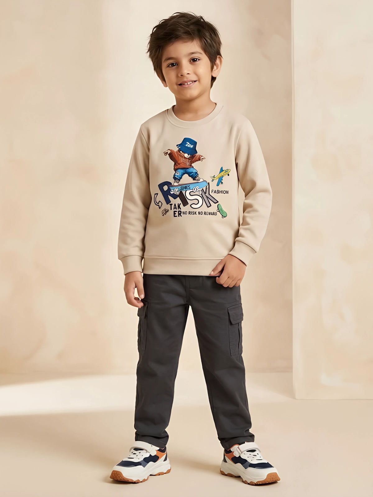 Cream bear graphic print t-shirt for boys with skateboard design.
