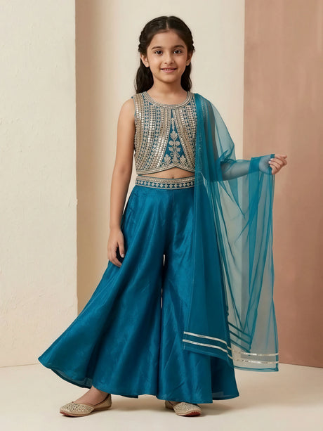 Girls blue ethnic palazzo set featuring an embroidered sleeveless crop top, flared palazzo trousers, and a matching dupatta