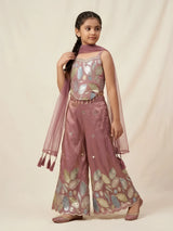 Shop stylish girls purple embroidered palazzo set featuring leaf embroidery, mirror work pants, and tassel dupatta for festive occasions.