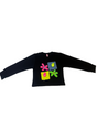 Girls' black long-sleeve top with four colorful patchwork squares and flower appliqués in neon pink, yellow, green, and blue on the chest.

Export to Sheets