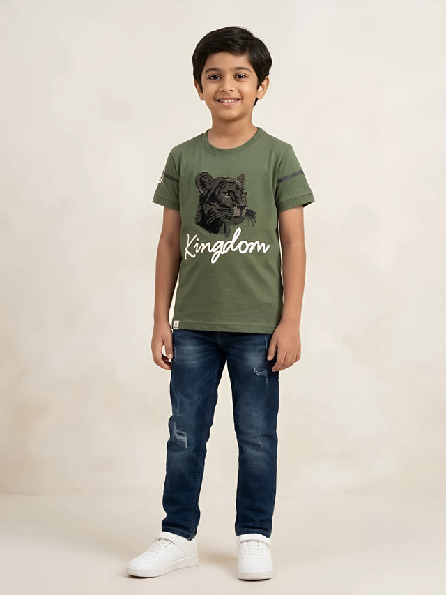 Boys wearing an olive green short sleeve crew neck t-shirt with a panther graphic and Kingdom text design