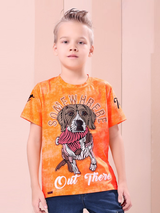 Young boy modeling a bright orange T-shirt with a subtle wash effect, featuring a large, stylized dog graphic and the text 'Somewhere Out There' in white.
