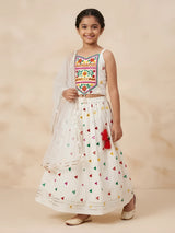 White embroidered lehenga choli set for girls with colorful geometric prints.