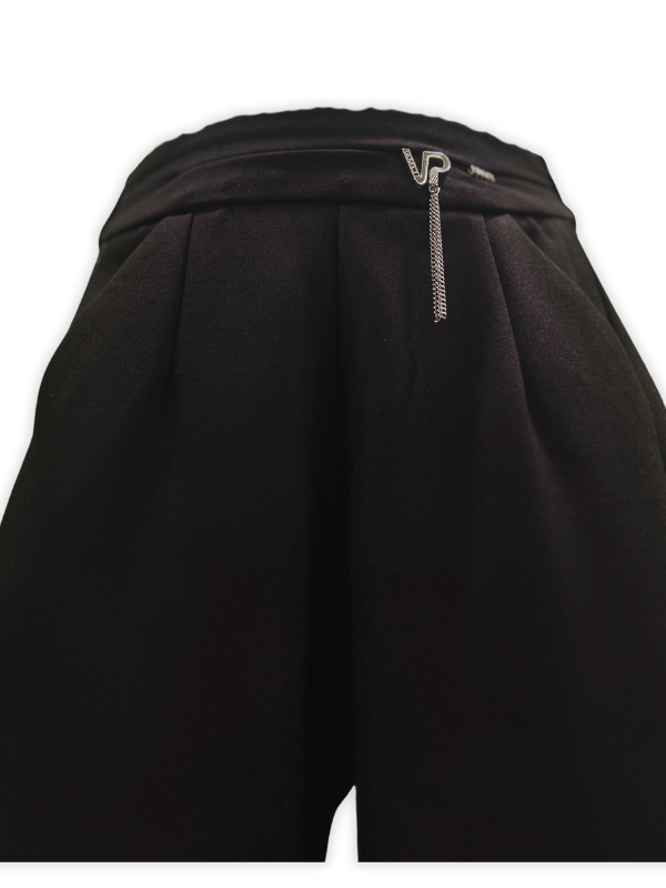 Girls' navy blue wide-leg trousers with a smooth, tailored fit, featuring a gold zipper accent and a fine metallic gold glitter stripe down the side seam.