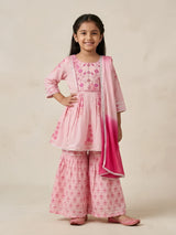 Young girl wearing a light pink floral printed and embroidered sharara set with a dual-tone pink dupatta