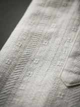 Boys White Textured Kurta Set.